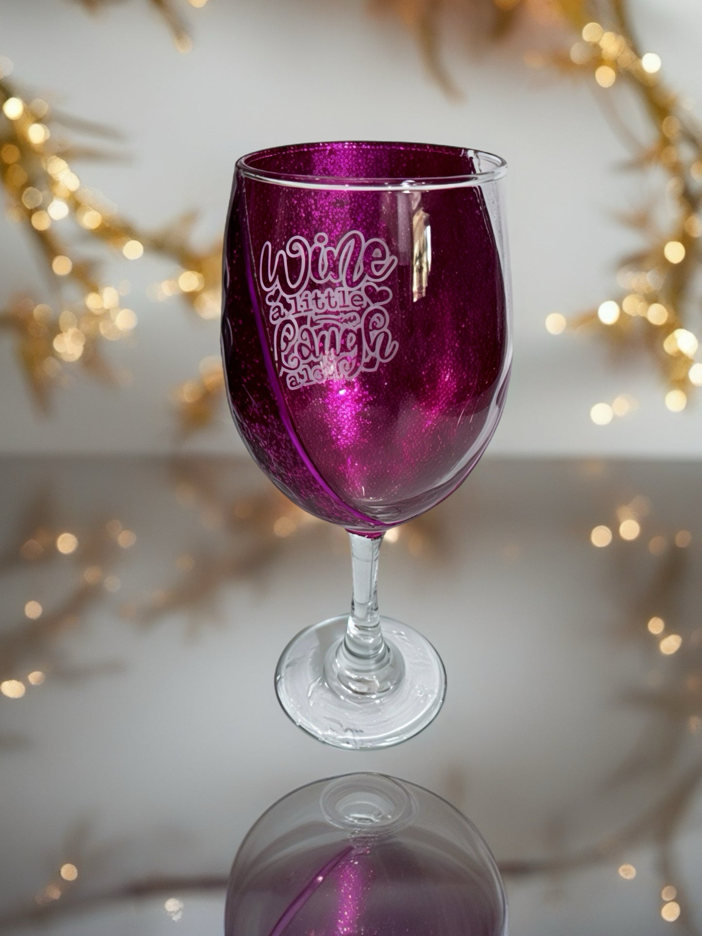 “Wine a Little, Laugh a Lot” Wine Glass
